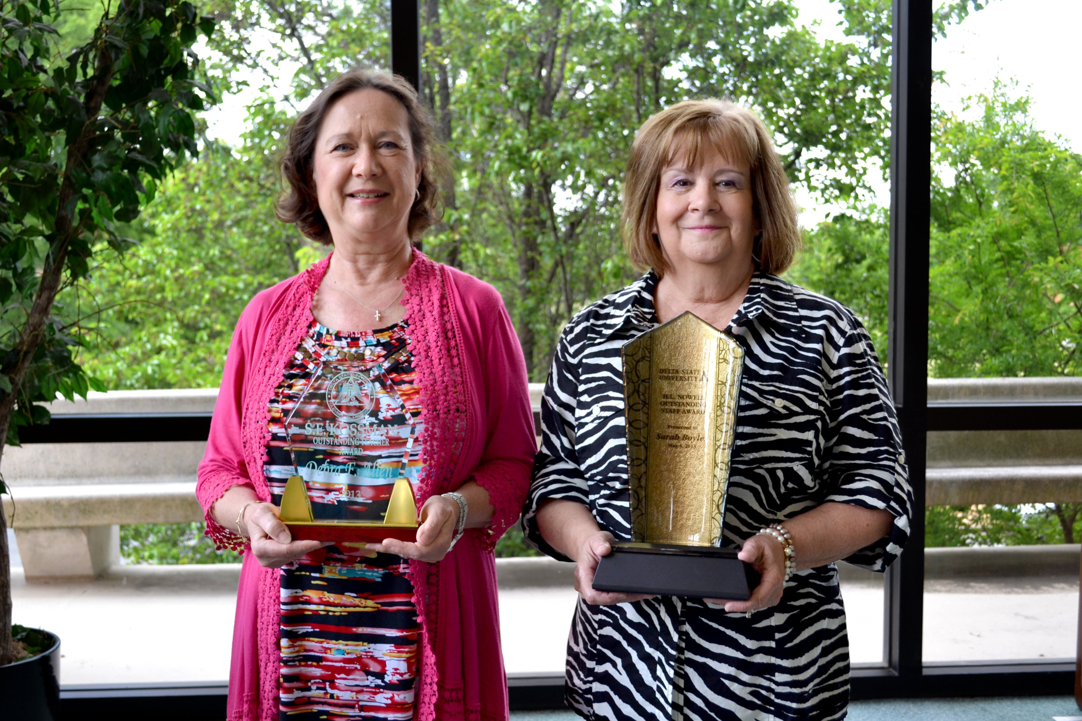PHOTO:  From left, S.E. Kossman Outstanding Faculty Award winner Debra Allen and H. L. Nowell Outstanding Staff Award winner Sarah Boyles.